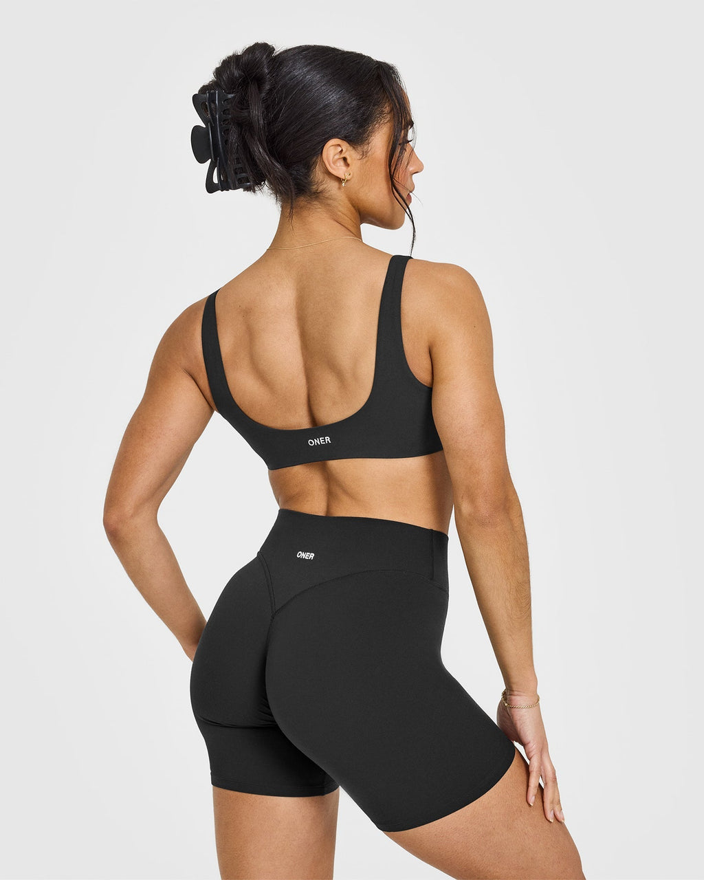 SoftMotion™ Scoop Back Bralette with White Logo | Soft Black