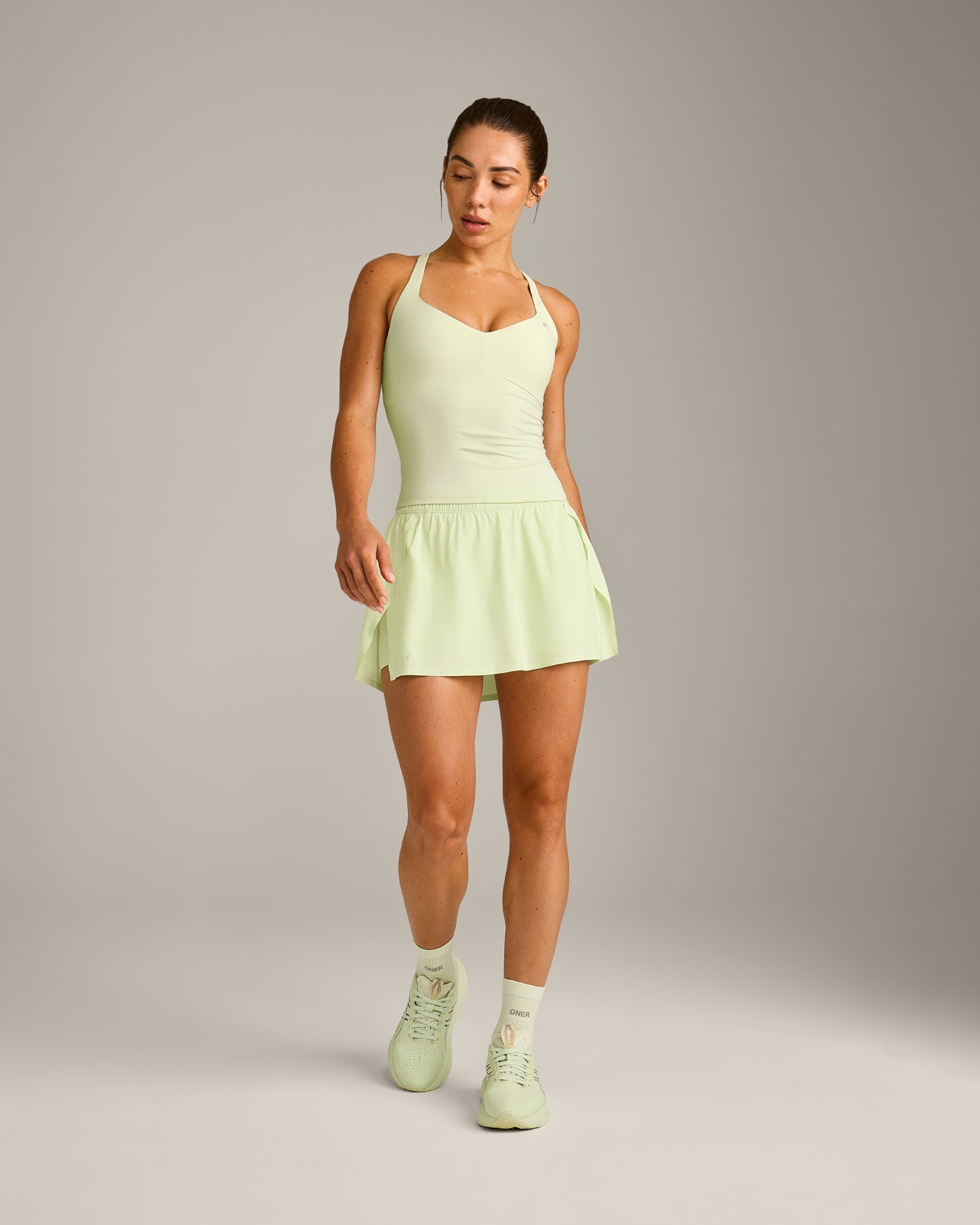 UnifiedMove™ T Back Mid Tank Top with Built in Bra Shelf New Branding | Meadow Mist Green